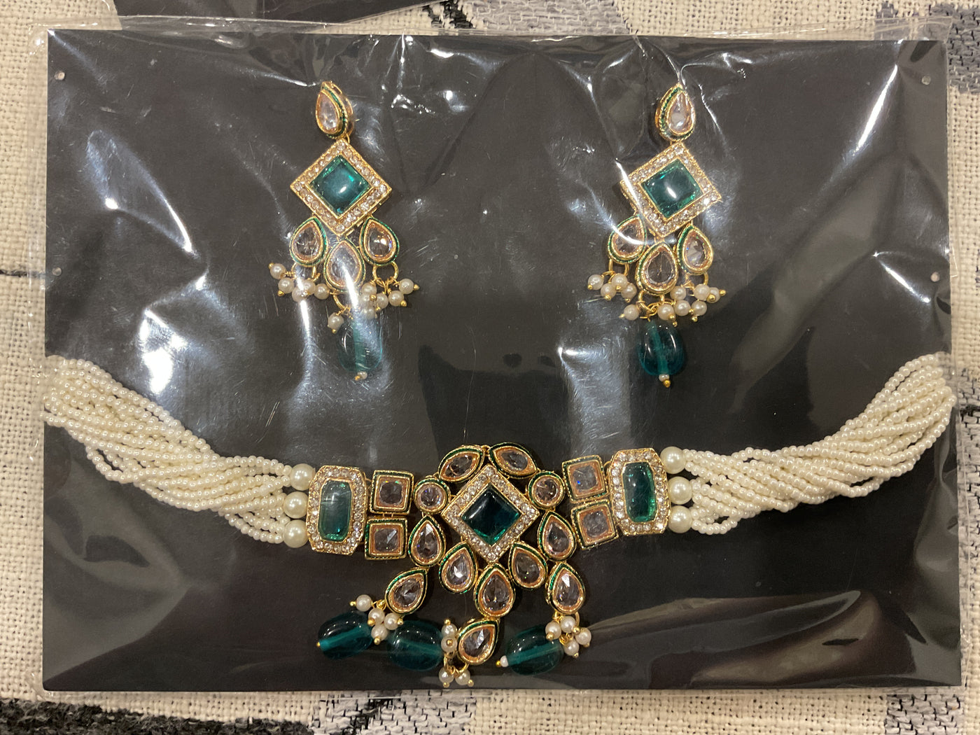 Kundan Choker Set – Pearl Multi-Strand with Emerald Green Drops & E…