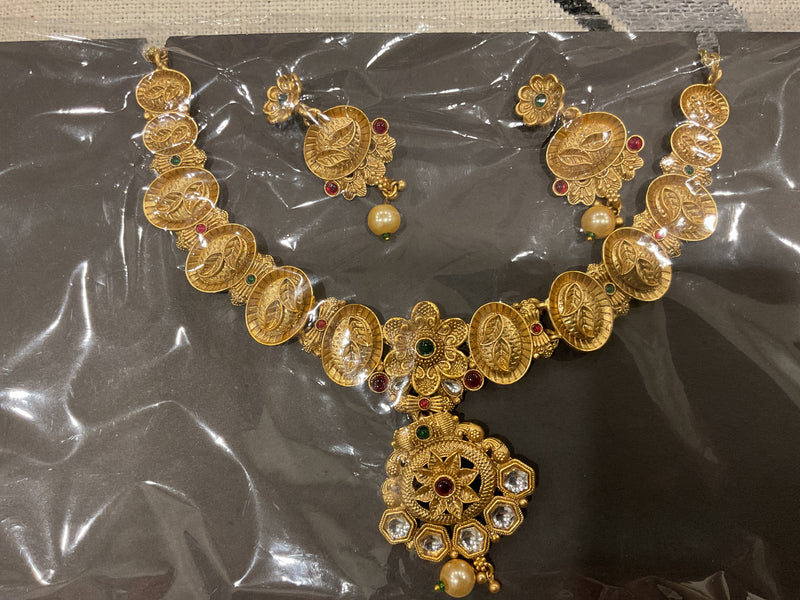 Gold-Plated Leaf Coin Necklace – Kundan Pendant, Ruby & Emerald wit…