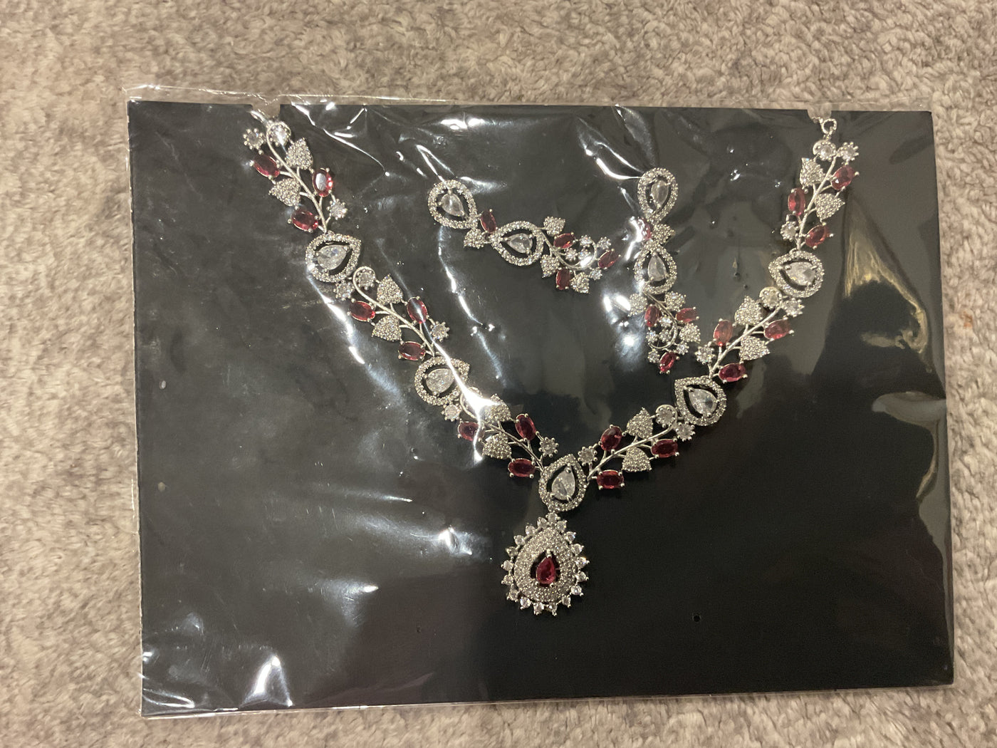American Diamond Floral Medallion Necklace Set – Red Stone Teardrop Pendant with Matching Earrings