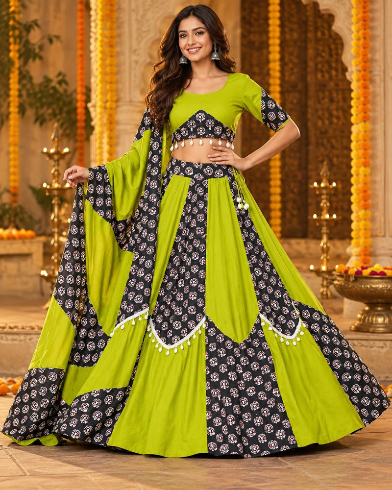 Lime green and black chaniya choli set with dupatta, block print with pompom trim