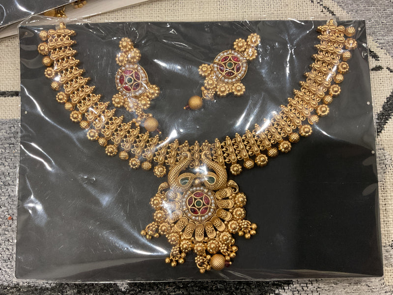Kundan Temple Necklace Set – Peacock Pendant, Ruby & Emerald Stones…