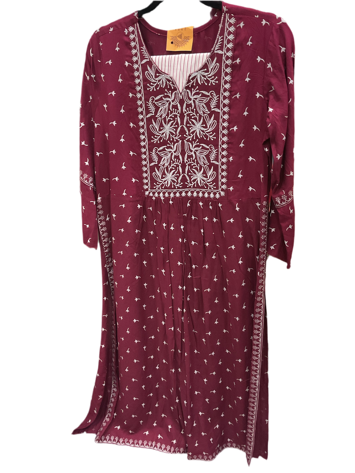 Maroon kurta with white sprig print and white floral embroidered yoke