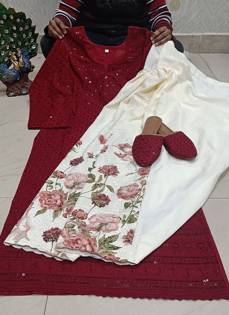 Maroon Phulkari embroidered kurti with a cream floral-print bottom