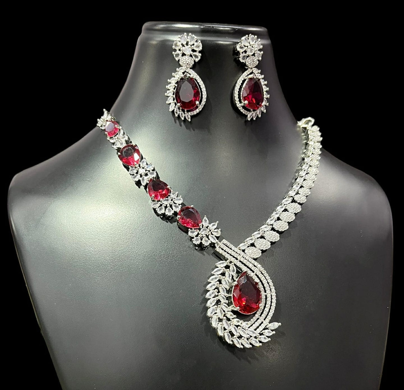 American DiamoAmerican Diamond Swirl Vine Necklace Set – Ruby Red Oval Pendant Drop with Matching Earringsnd (AD) Necklace Set