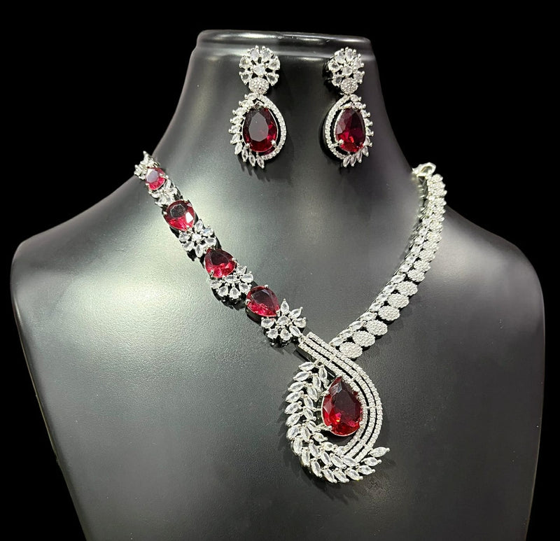 American DiamoAmerican Diamond Swirl Vine Necklace Set – Ruby Red Oval Pendant Drop with Matching Earringsnd (AD) Necklace Set