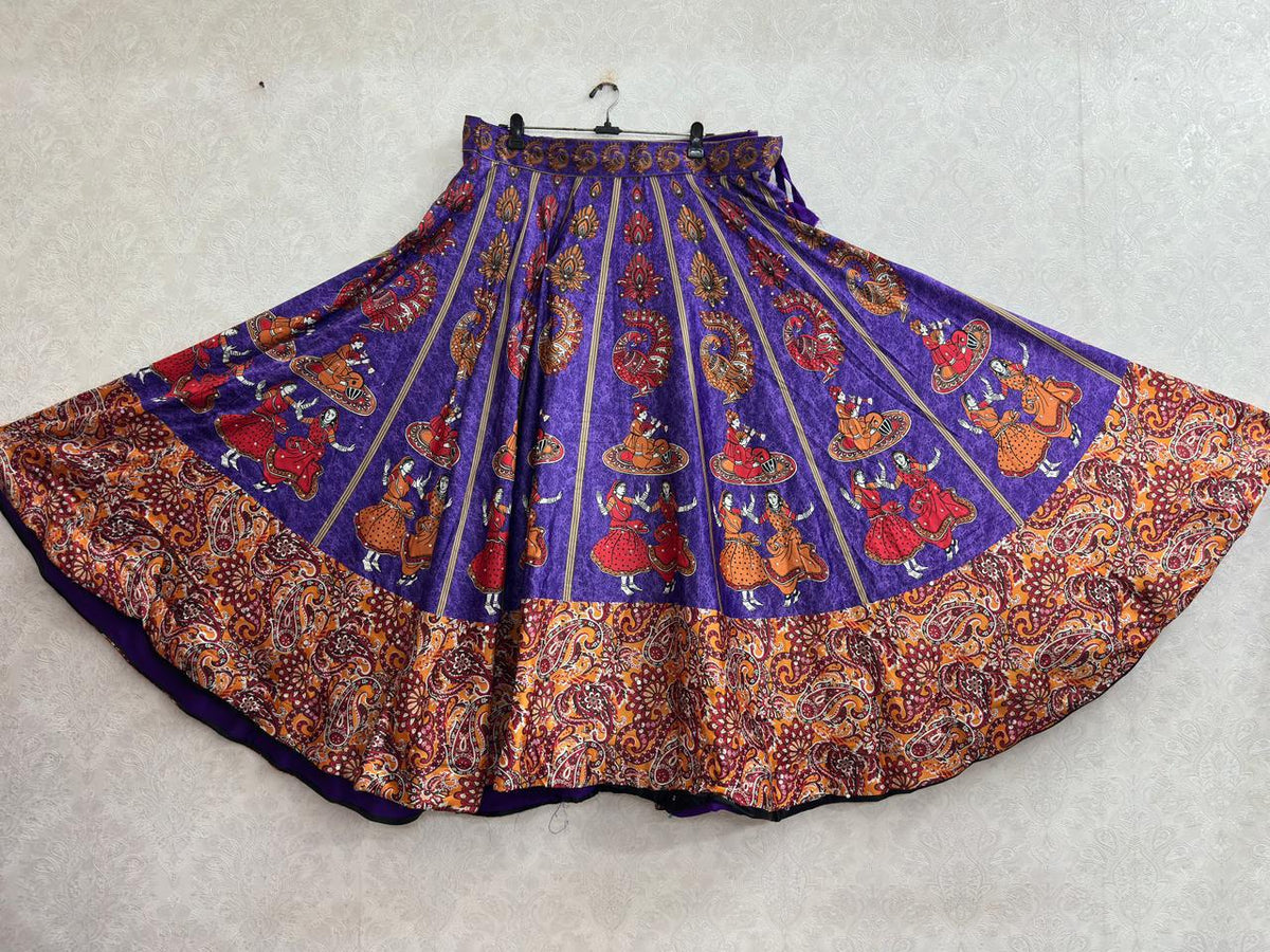 Purple chaniya choli skirt with folk dancer and peacock print