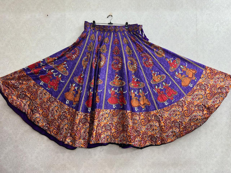 Purple chaniya choli skirt with folk dancer and peacock print