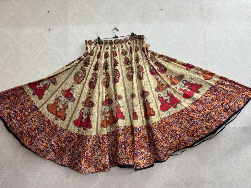 Cream chaniya choli skirt with folk dancer print and paisley border