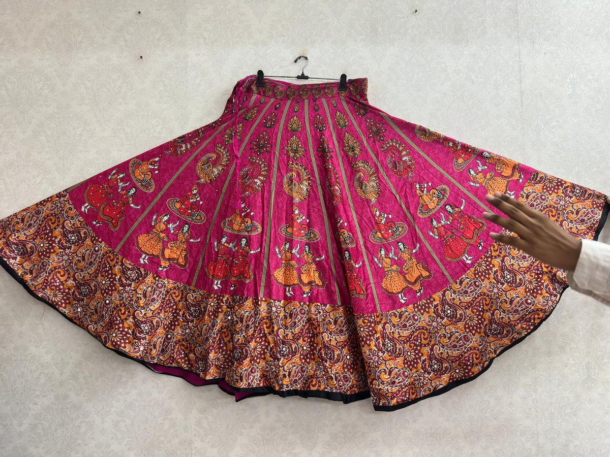 Magenta chaniya choli skirt with folk dancer print and paisley border