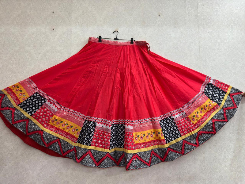 Red chaniya choli skirt with mirror work ikat border