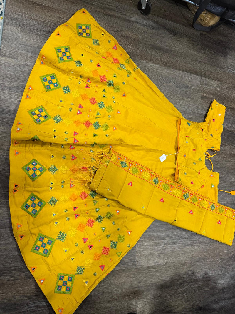 Mustard yellow chaniya choli set with dupatta, geometric appliqué and mirror work