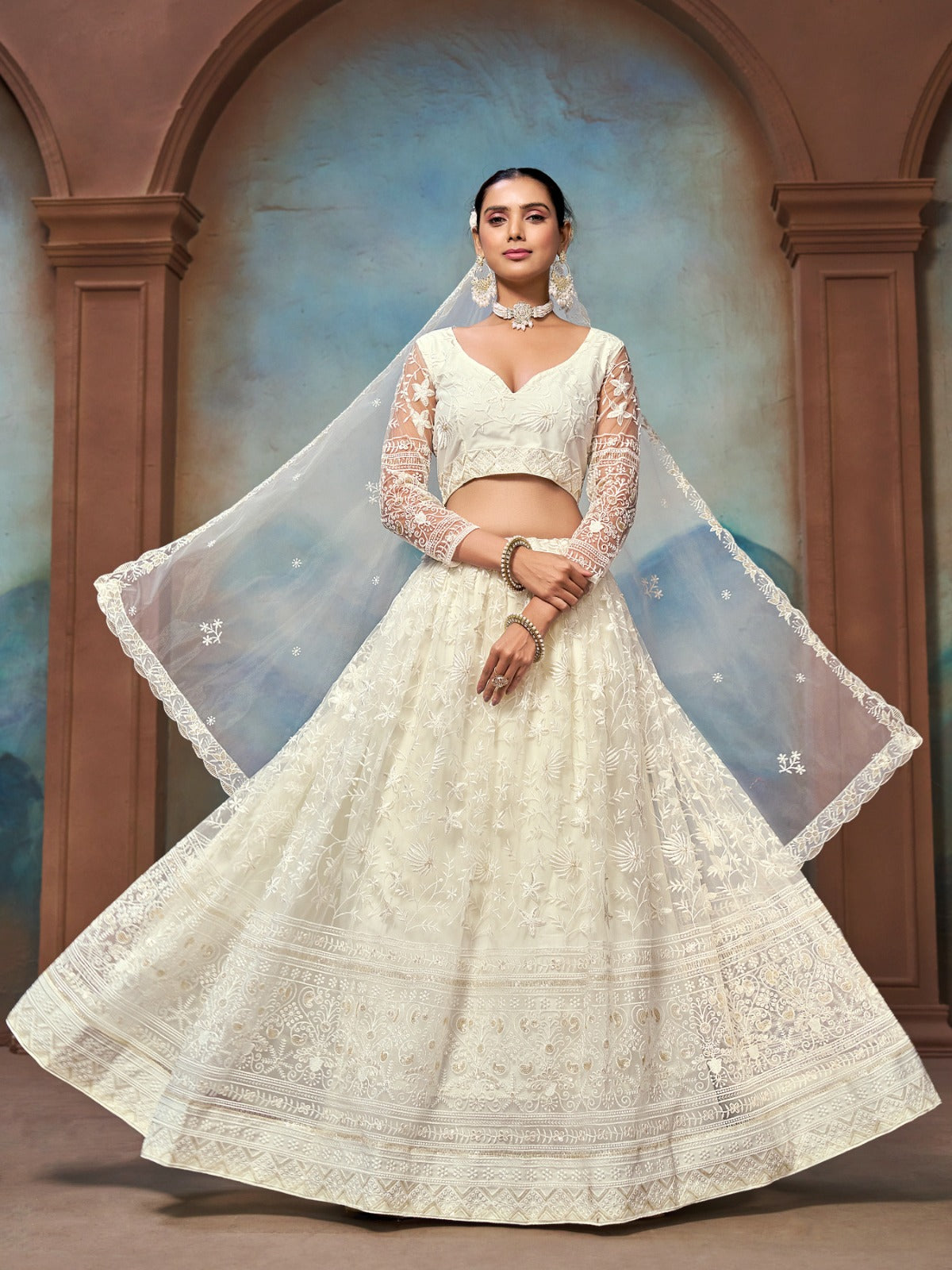 Ivory colorway outfit in motion showing full flare, tonal white-on-white floral embroidery throughout