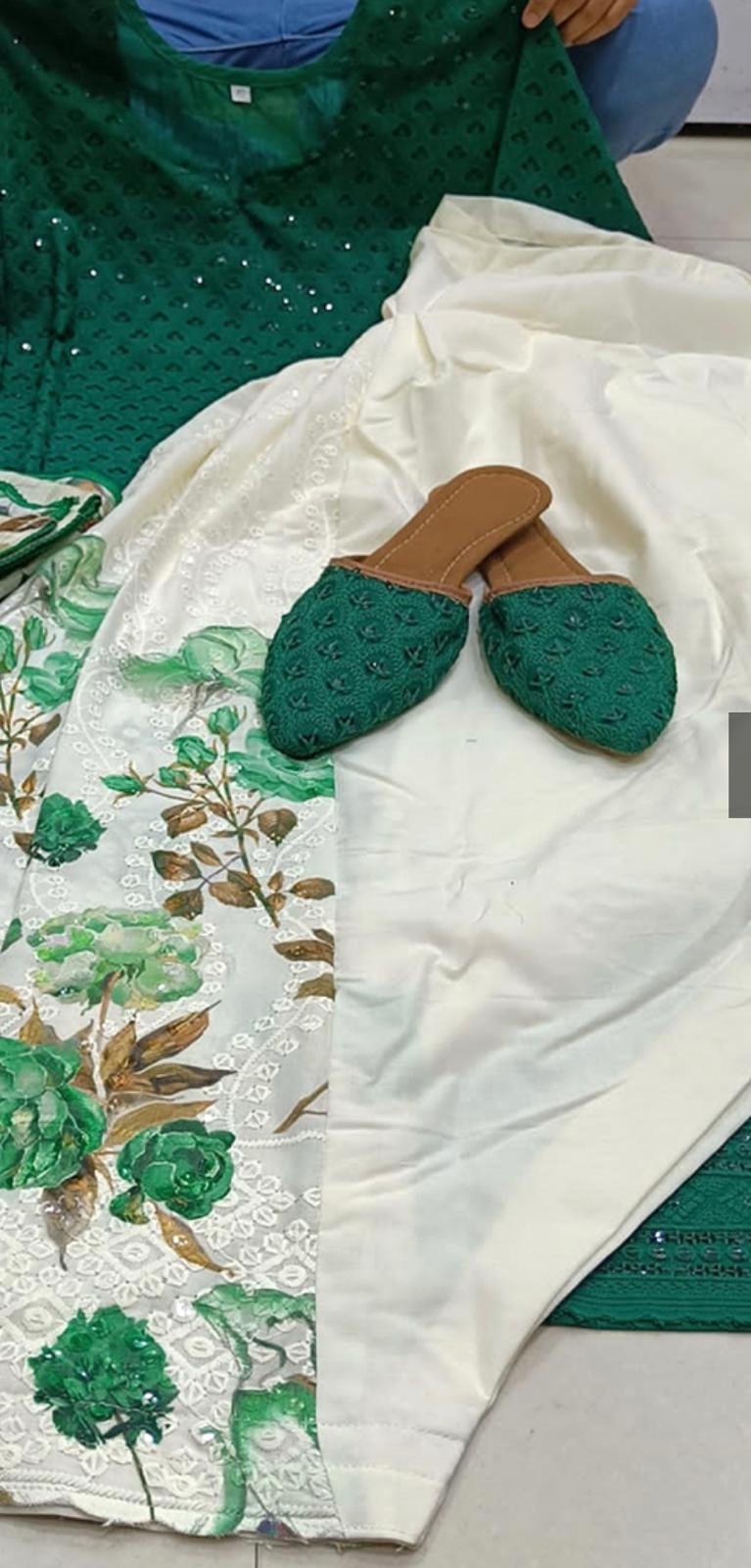 Green Phulkari embroidered kurti with a cream floral-print bottom